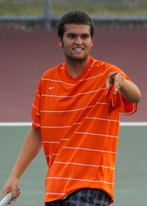 Warsaw's Nikos Schlitt reacts to playing partner Will Petro during the tandem's win over Wawasee.