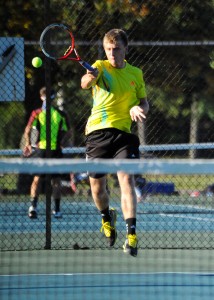 Warsaw's Sam Rice swings away against Goshen's Hudson Kay.