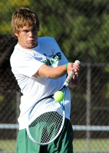 Wawasee's Luke Smith connects during his match with Concord's Jared Searer.