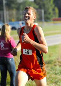 Warsaw's Tyler Houvner claimed second place in the NLC dual meet between the Tigers and visiting Wawasee Warriors Tuesday night. (Photos by Mike Deak)