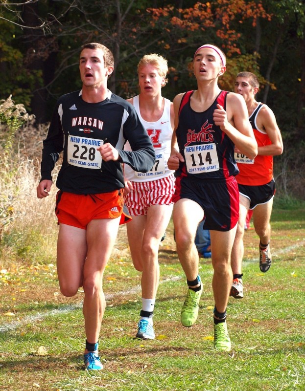 Warsaw's Ellis Coon leads the way in the semi state at New Prairie last Saturday. The senior star is one of a handful of contenders for a state championship this Saturday in Terre Haute (File photos by Tim Creason)