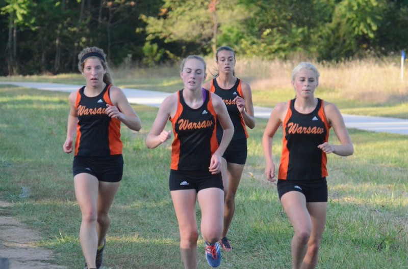 A quartet of Warsaw ladies run together Tuesday night. The Tigers beat Concord and Plymouth in NLC action at Ox Bow Park (Photos by Scott Davidson)