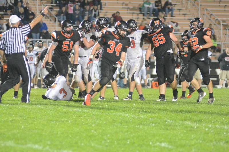 The Warsaw defense is fired up after making a play Friday night.