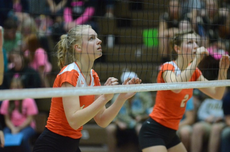 Warsaw's Katie Voelz patrols the net during action at Penn Monday night. The No. 14 Kingsmen defeated the Tigers 3-1 (Photos by Scott Davidson)