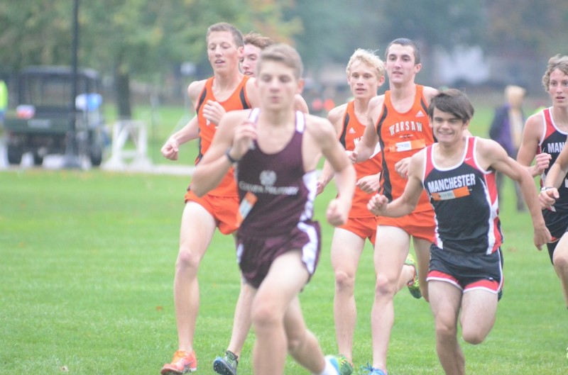 A trio of Warsaw runners jockey for position early on at the Culver Academies Sectional Tuesday night.