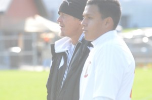 Warsaw boys soccer coach Scott Bauer and Manuel Rodriguez watch semi state action Saturday.