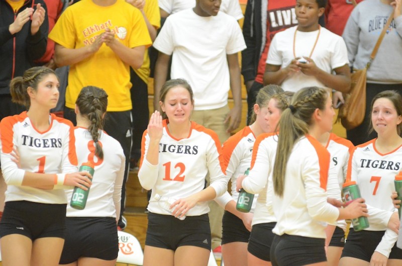 Warsaw senior Delaney Goble shows her emotions after a 3-2 loss to Elkhart Memorial in volleyball sectional semifinal play Saturday at Warsaw (Photos by Scott Davidson)