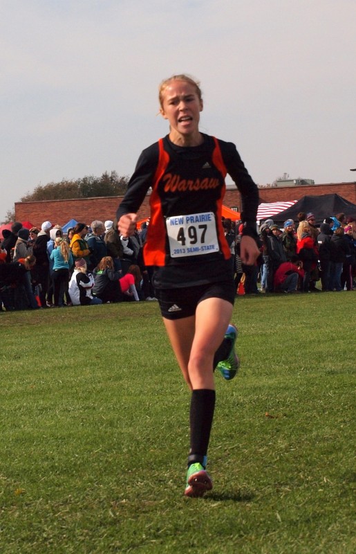 Warsaw freshman Allison Miller nears the finish line Saturday in the New Prairie Cross Country Semistate. Miller led the Tigers to a fourth place finish to earn a spot in the State Finals next Saturday in Terre Haute (Photos by Tim Creason)