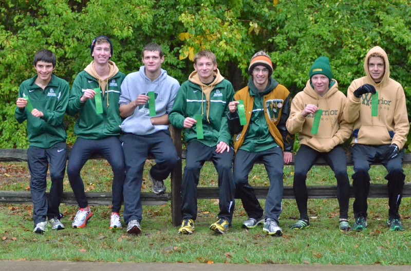 Those are more than just fifth place ribbons, they are tickets to next week's semi-state meet for the Warriors. (Photos by Nick Goralczyk)