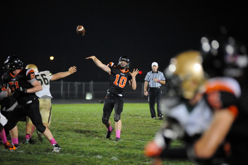 Warsaw quarterback Austin Head looks to keep his team in the race for a conference title Friday night. The Tigers host NorthWood in NLC action (File photo by Mike Deak)