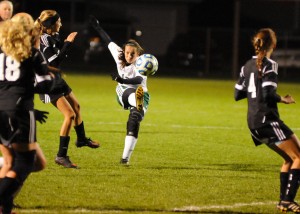 Northridge midfielder Brianne O'Dell unleashes a shot during the second half against Warsaw.