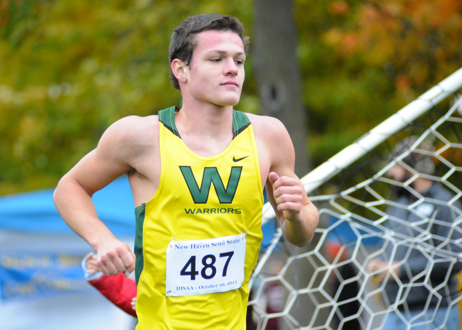 Wawasee's Zach Cockrill speeds through the course at the New Haven Cross Country Semi-state Saturday afternoon. Cockrill finished just one place out of qualification for the state finals, while Wawasee's team placed 12th overall. (Photos by Mike Deak)