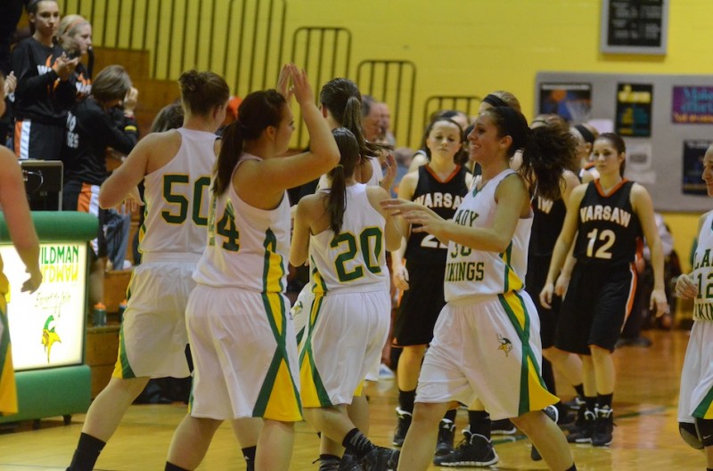 Casey Dunn (left) congratulates Caylie Teel following Valley's 57-50 win over Warsaw Friday night at Valley.