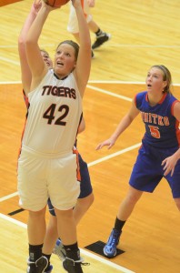 Warsaw senior Nikki Grose powers her way to two of her game-high 19 points during a 64-42 win over Whitko Friday night (Photos by Scott Davidson)