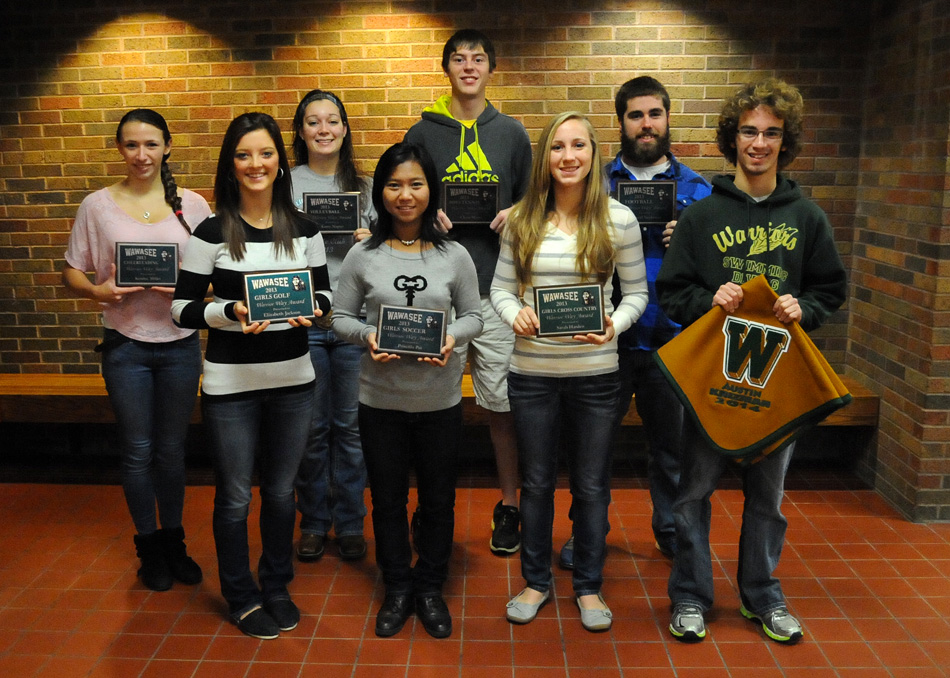 Wawasee High School held its fall awards Tuesday night and honored its fall sports. Among the awards were the Warrior Way Award recipients, given to athletes that display character and sportsmanship. The Warrior Way winners, along with the blankets winners are, in front from left, Elizabeth Jackson, girls golf; Priscilla Par, girls soccer; Sarah Harden, girls cross country; and Austin Krizman, blanket, boys cross country. In the back row are Kendra Miller, cheerleading; Kasey Napier, volleyball; Chase Myers, boys tennis; and Ronald Vardaman, football. Not pictured are Fernando Camargo, boys soccer; and Austin Yoder, boys cross country. (Photo by Mike Deak)