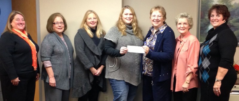  TriKappa president Shari Skaggs and member Sara England are shown presenting a check for $300 to members of the 2014 Walk-n-Wander Warsaw planning committee. From left are Mary Kittrell, Kosciusko County Convention & Visitors Bureau; Cindy Dobbins, Warsaw Community Development Corporation; Skaggs and England; Darla McCammon, Lakeland Art Association; Michelle Bormet, Warsaw Mayor’s office; and Paula Bowman, First Friday events coordinator. Donations will be accepted through mid December for the exhibit of life-size sculptures in downtown Warsaw next summer. (Photo provided)