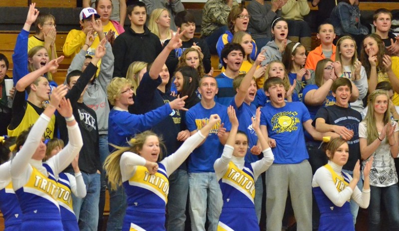 The Triton student section goes crazy after the Trojans hit a buzzer-beating three at the end of the third quarter. (Photos by Nick Goralczyk)