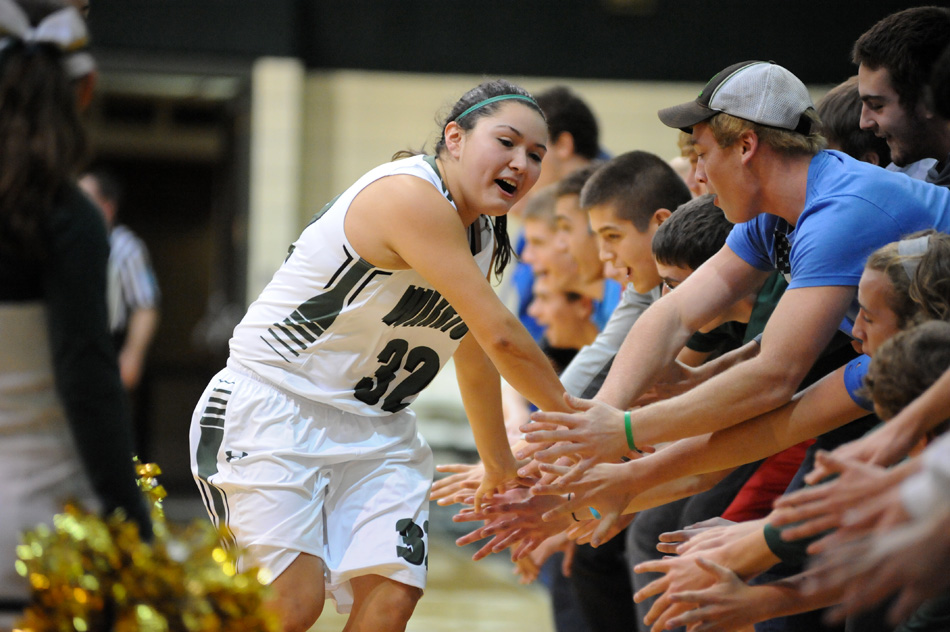 Allissa Flores gathers encouragement from the home fan base.