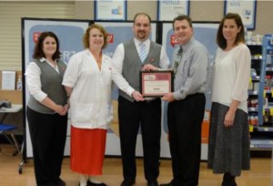 Pictured in the photo of Walgreens (from left): Danielle Renbarger, Walgreens Assistant Manager; Jennifer Hoover, Walgreens Pharmacy Manager; Jonathan Goss, Walgreens Manager; Mark Dobson IOM, President and CEO Warsaw Kosciusko County Chamber; and Renea Salyer Member Relations Coordinator Warsaw Kosciusko County Chamber.  (Photo provided)