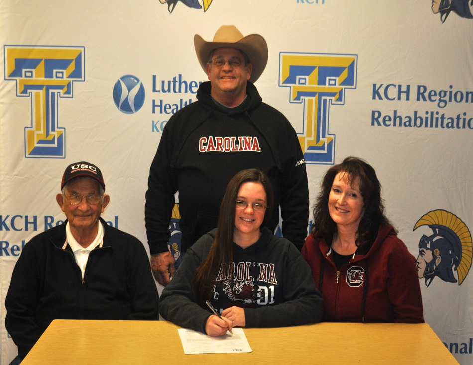 Triton High School senior Bailey Walters has signed a letter of intent to continue her riding career at the University of South Carolina. Pictured are, from left to right, grandfather Duane Walters, father Brett Walters, Bailey Walters and mother Sheila Conley. 