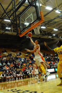 Rashaan Jackson goes up for two of his team-high 19 points for Warsaw (Photo by Amanda Farrell)