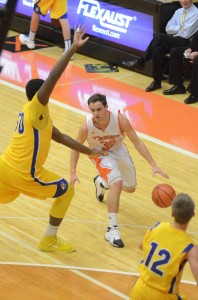 Warsaw senior Jordan Stookey tries to drive past Caleb Swanigan of Homestead Friday night. Swanigan led the Spartans to a 49-48 win.