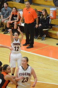 Kilee Slone follows through after a jumper for the Tigers. 