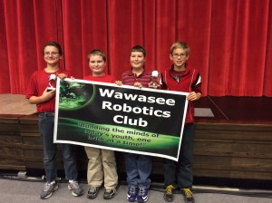From left are Ryan Zorn, Jack Collins, Braxton Studebaker and Clay Kelsheimer. The four Wawasee Middle School students made up a robotics team placing second in the state competition. This photo was taken during a November competition at Grace College. Not all of the team members were available for photos following the competition Saturday. (Photo provided)