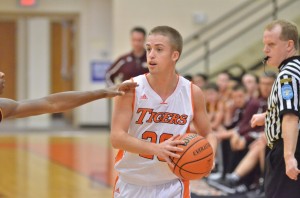 Warsaw's Nate Pearl looks for a teammate to pass to in third quarter action.