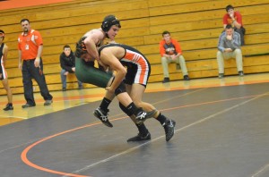 Zac McKee gets taken down by Warsaw's Brady Stout. McKee would win the match with a minor decision.