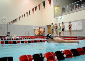 Wawasee's Caitlin Clevenger, near, races teammate Shelby Adams in the individual medley Tuesday night at NorthWood. The IM was the only race Wawasee did not have a clean sweep. (Photos by Mike Deak)