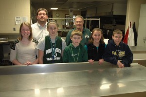 In front, from left, are Wawasee Middle School students Brooke Heche, Sara Pritchard, Jared Pritchard, Macie Stuckman and Garrett Stuckman. In the back row are Shawn Johnson, assistant principal of WMS, and Rick Vester, representing the Knights of Columbus in Syracuse