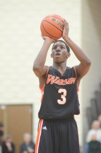 Paul Marandet focuses from the line for the Tigers in the first half Friday night at Northridge.