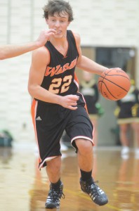 Tim Swanson heads to the hoop for the Tigers Friday night.