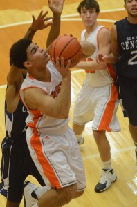 Warsaw's Rashaan Jackson powers inside for two points Tuesday night.