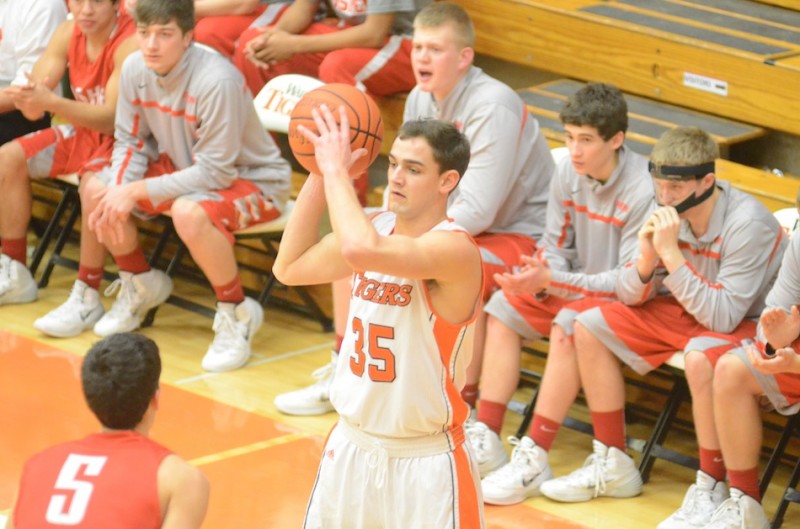 Warsaw's Jordan Stookey turned in an outstanding effort Friday night to lead the Tigers past Goshen 48-41.