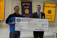 Pictured are Tracy Furnival accepting for the Baker Youth Club and Chris Wiggins presenting the check representing the Warsaw Breakfast Optimist Club.  (Photo provided)