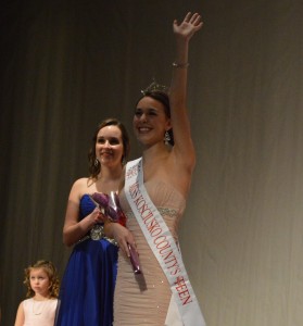 Alexandria Fiscus waives to the crowd after being crowned Miss Kosciusko County's Outstanding Teen 2014. Breonna Cole and Alyssa Hochstetler are shown to the left