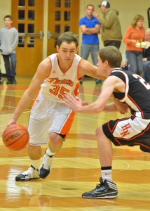 Jordan Stookey and the Warsaw Tigers will have its hands full Friday night as Triton will come calling to the Tiger Den. (File photo by Nick Goralczyk)