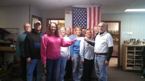 Participating in Thursday’s presentation were from the left, Ron Erb, food pantry; Gary Holloway, Michele Farkas, both from Pie-Eyed Petey’s; Shirley Strock, Mary Erb, Mary Hartley, Beth Becker, Barb Miller and J.B. Routh, all from the food pantry.