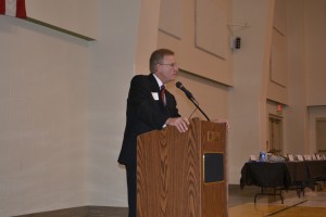 Chamber President Richard Owen addresses a record-breaking audience of 183 during the Syracuse-Wawasee Chamber of Commerce awards dinner.