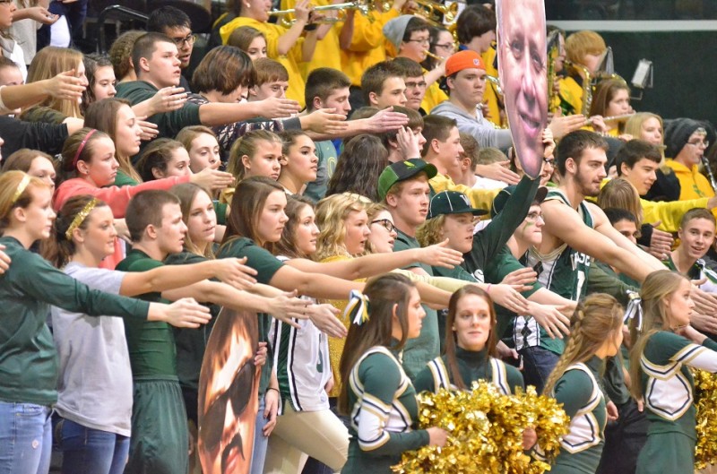 The Wawasee cheer block does the tomahawk chop before the tip in Friday's NLC contest. (Photos by Nick Goralczyk)