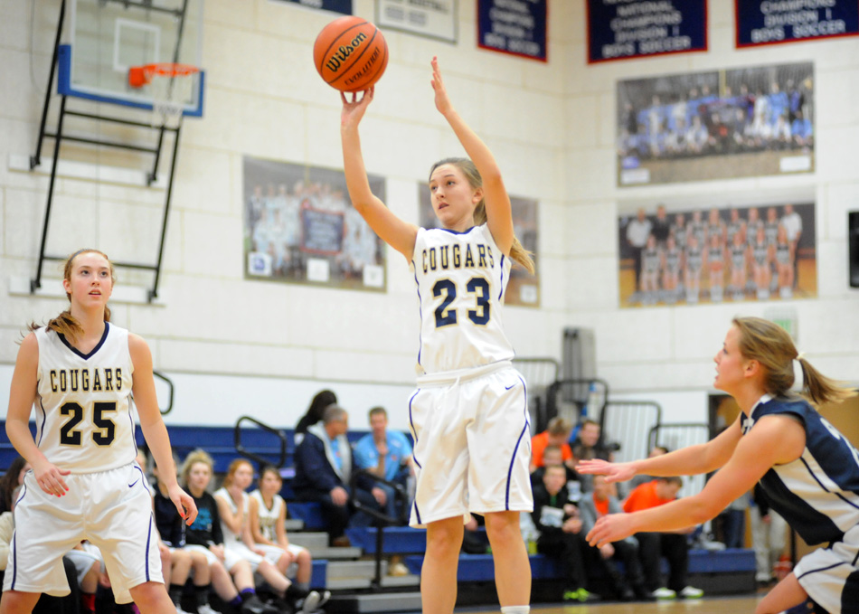 Hannah Delp of LCA takes a jump shot against South Bend Trinity.