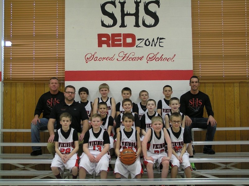 The Sacred Heart boys basketball team will play in the city elementary championship game in the Tiger Den on Feb. 12 (Photo provided)