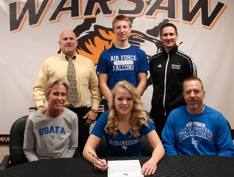 WCHS senior Claire Hickerson will continue her pole vaulting career at the Air Force Academy. Hickerson is flanked by her parents Jo and Bryan. In back are WCHS Athletic Director Dave Anson, Tommy Hickerson and WCHS girls track and field and cross country coach Scott Erba (Photo provided)