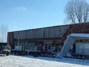 Emergency personnel are currently responding to the collapse of an overhang at Family Dollar in Syracuse.  (Photo provided by Justin McLaughlin) 