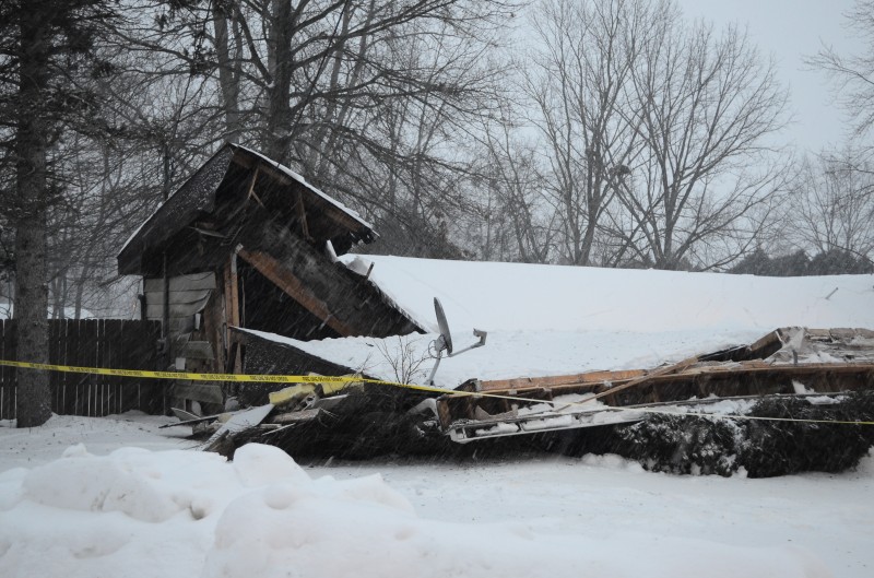 A vacant house in the Herscher Addition collapsed Monday night, presumable under the weight of heavy snow. (Photos by Stacey Page)