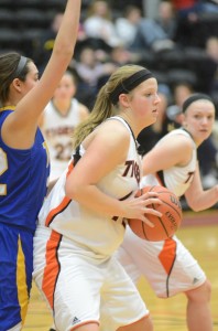 Nikki Grose led the way as Warsaw upended NLC rival NorthWood in overtime Monday night.