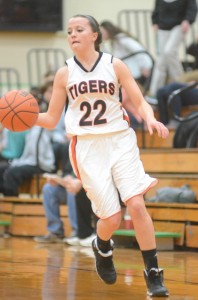 Eryn Leek moves the ball up court for Warsaw Tuesday night.