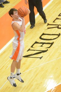 Tim Swanson prepares to let fly with a jumper for the Tigers.